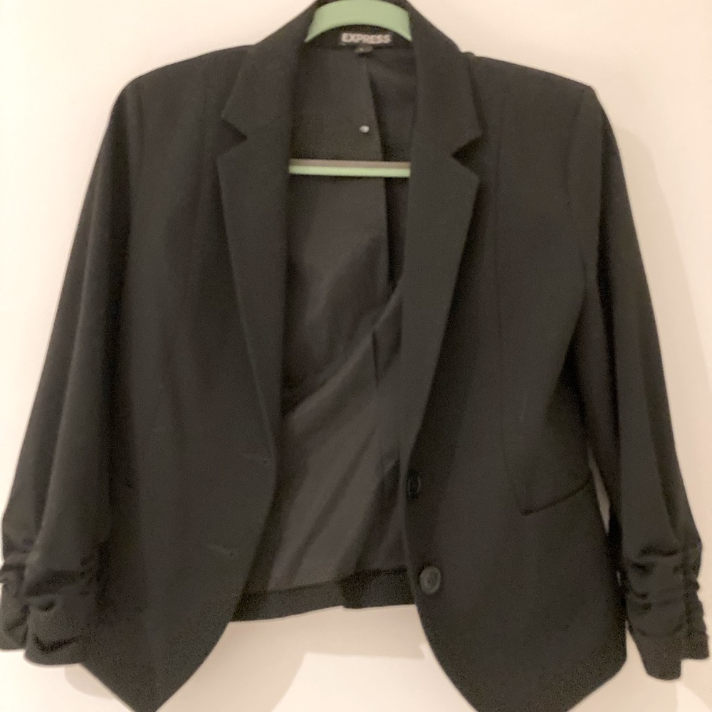Express. Size 6. Black blazer with rouched sleeve serial. Hem hits at waist.
